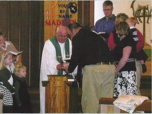 Baptism Ceremony Of Faithful Of The Evangelical Baptist Church In
